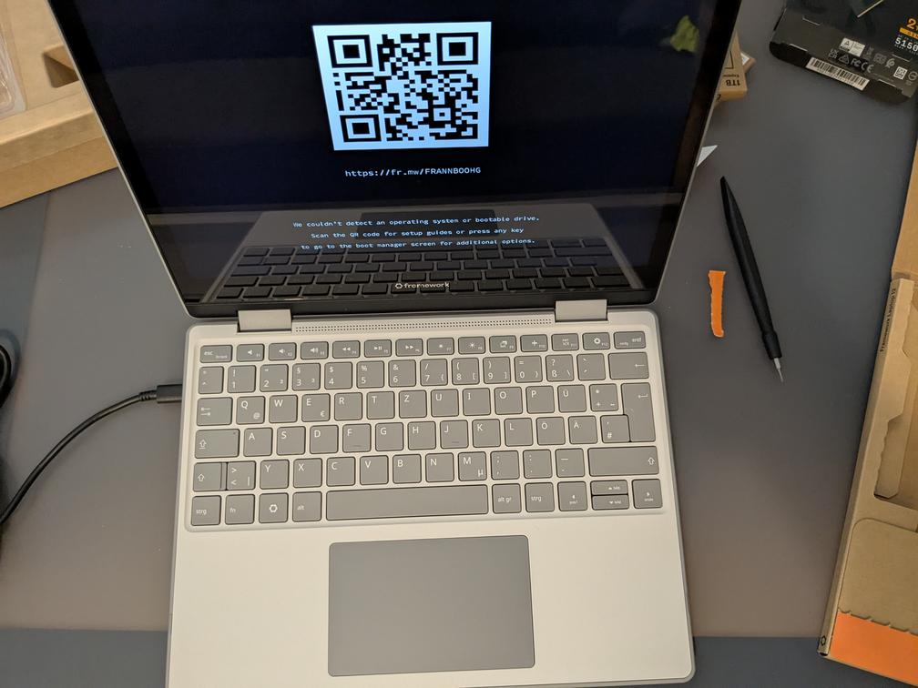 Image of the screen of the Framework 12 laptop, saying it could not detect an operating system